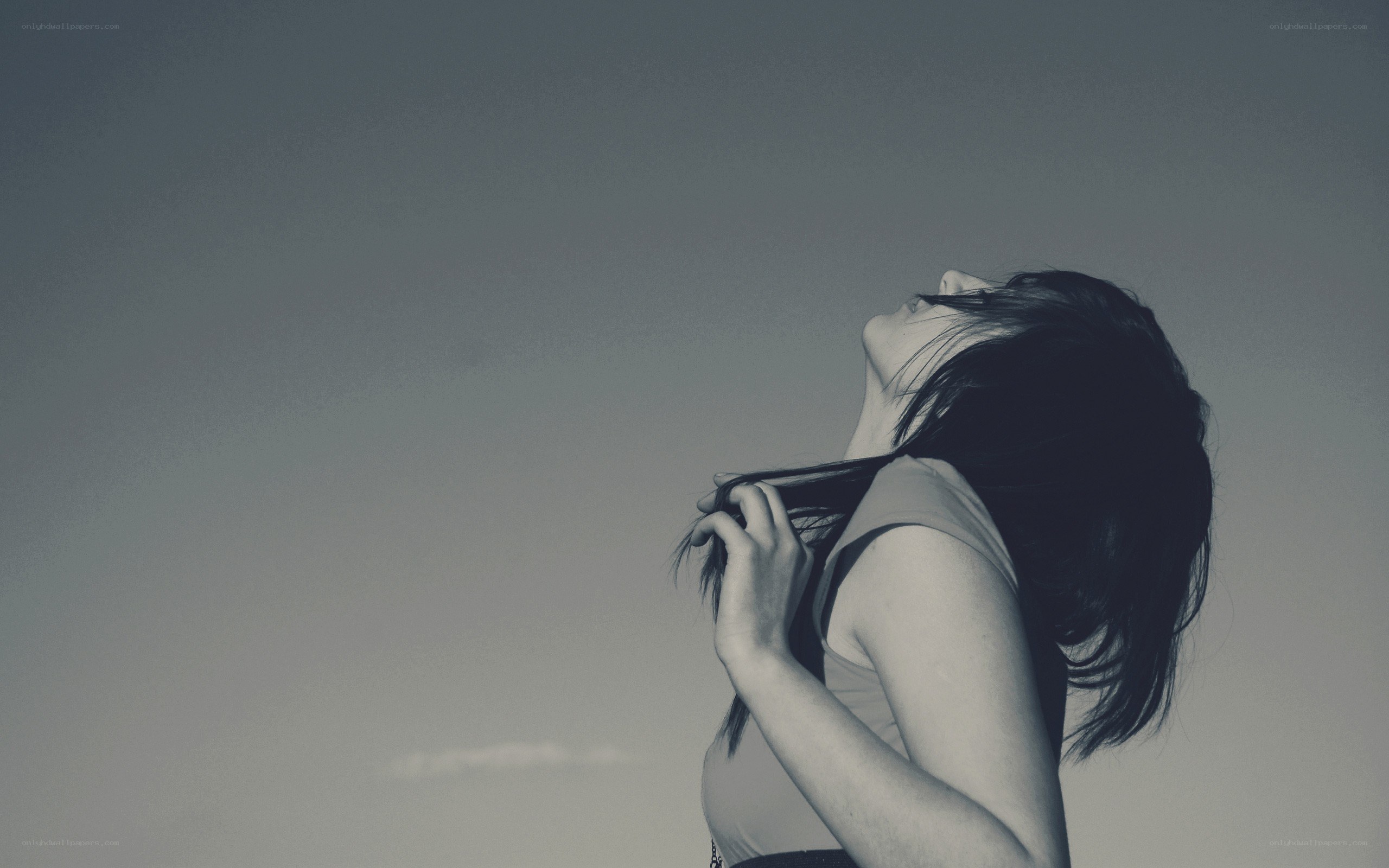 woman with head tilted back