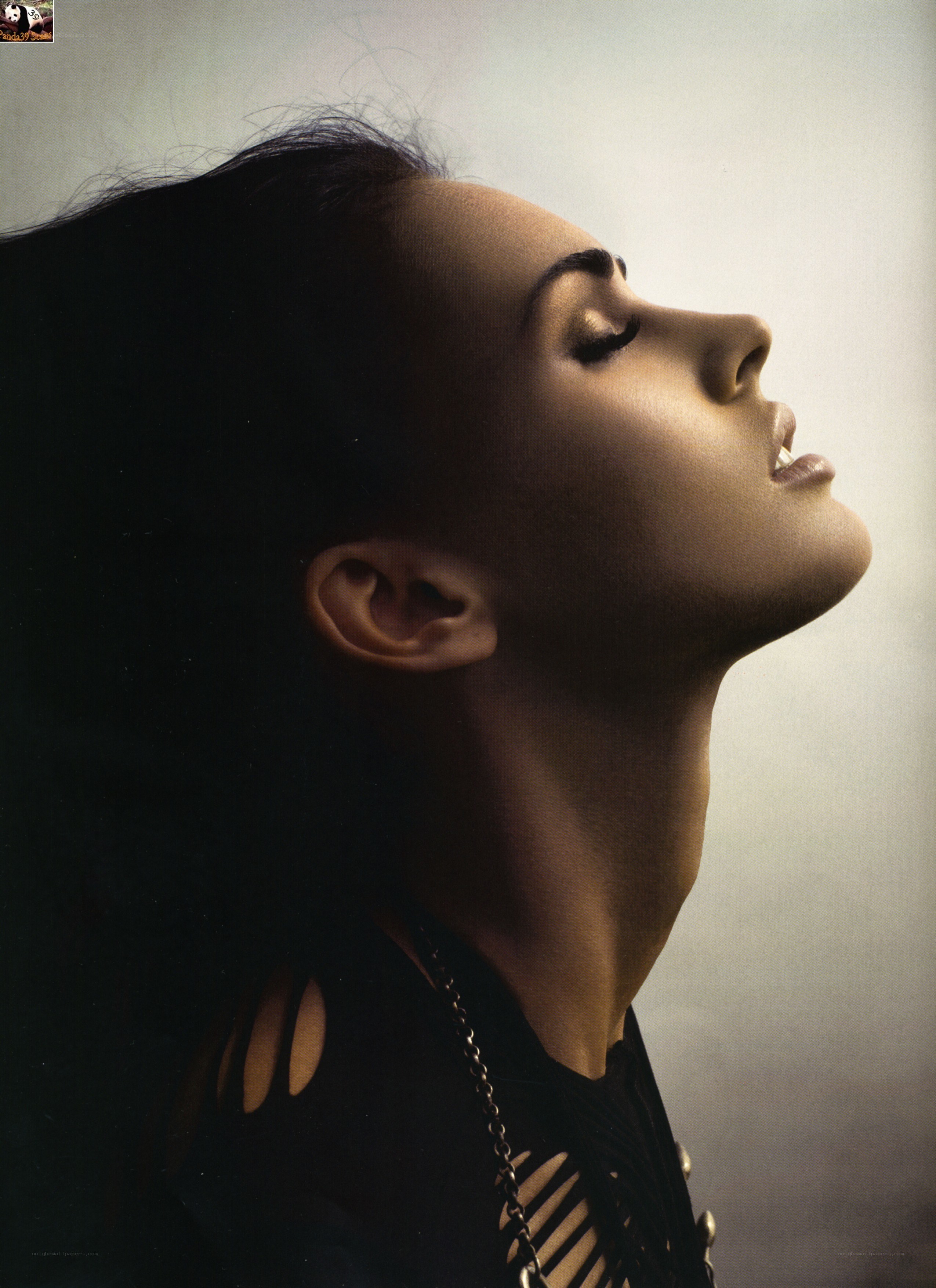 woman with head tilted back