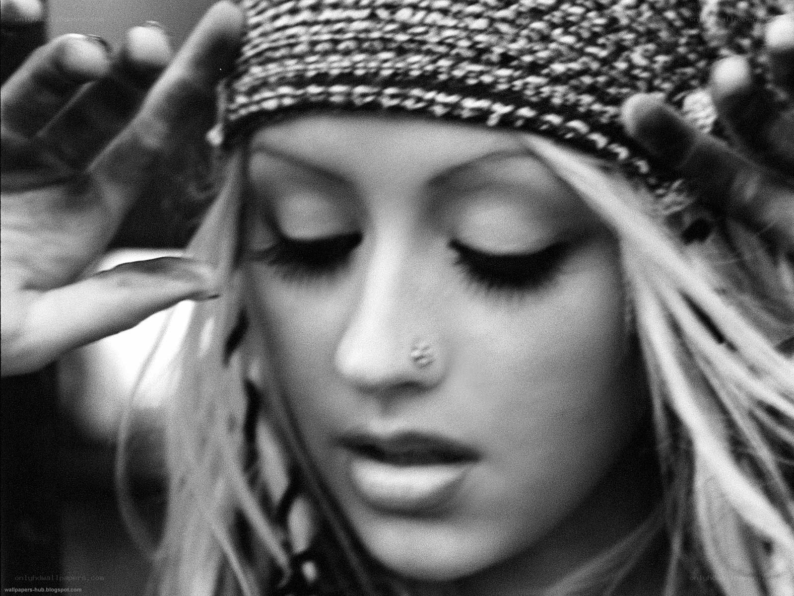 woman with headband and dreadlocks