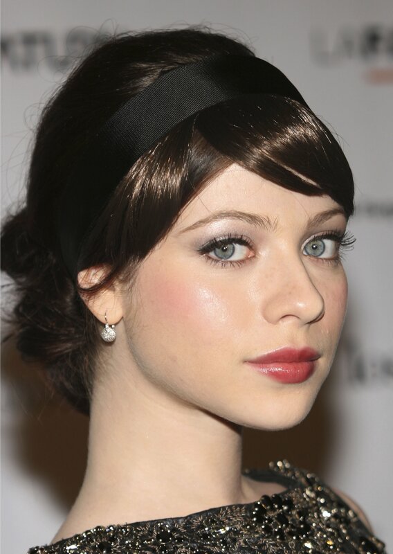 woman with headband and makeup