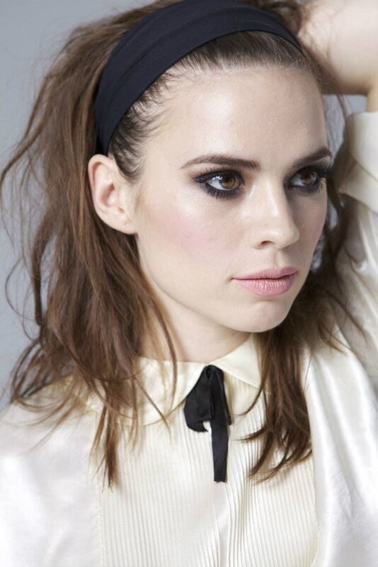 woman with headband and makeup