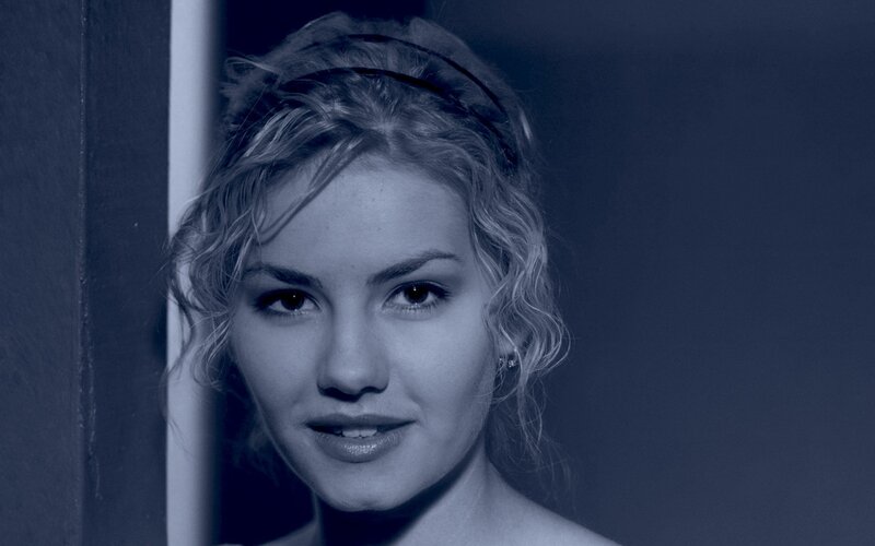 woman with headband in blue light