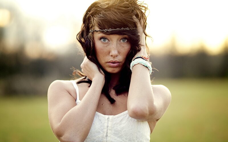 woman with headband in field