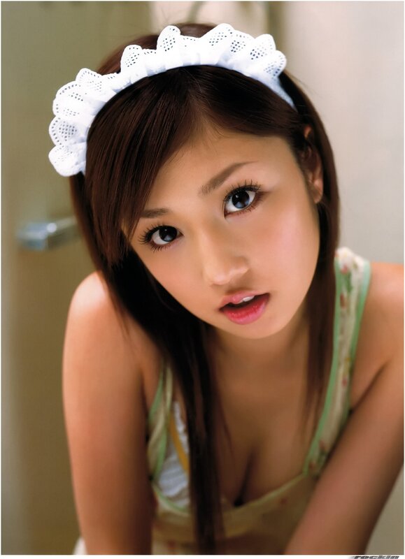 woman with headband looking at camera