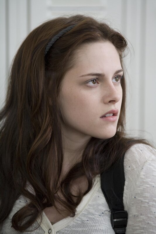 woman with headband looking away