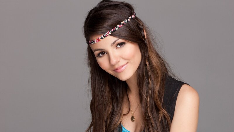 woman with headband smiling