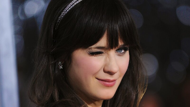 woman with headband smiling
