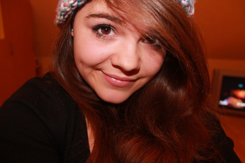 woman with headband smiling