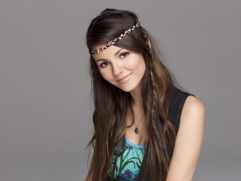 woman with headband smiling