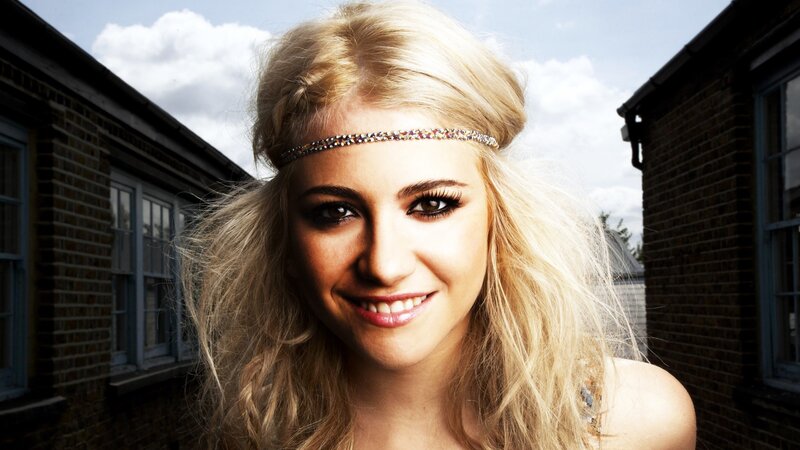 woman with headband smiling