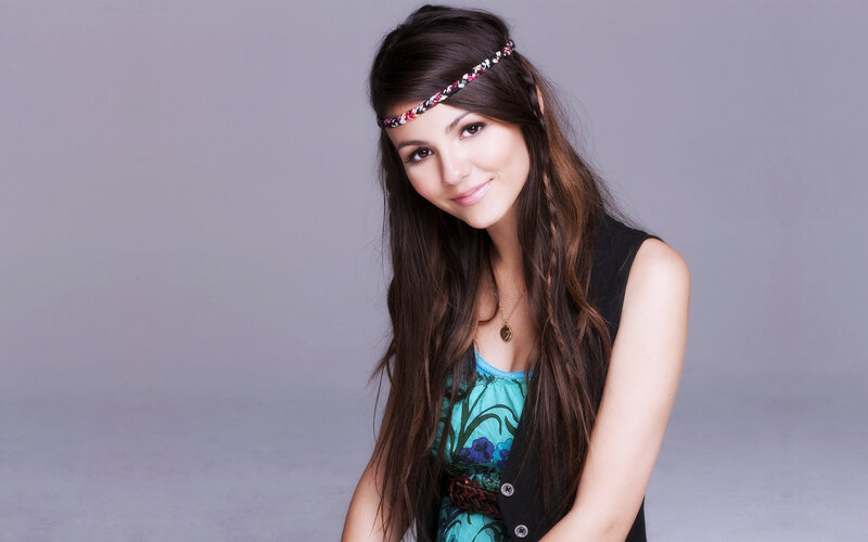 woman with headband smiling
