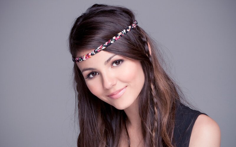 woman with headband smiling