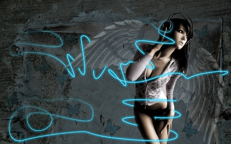 woman with headphones and angel wings