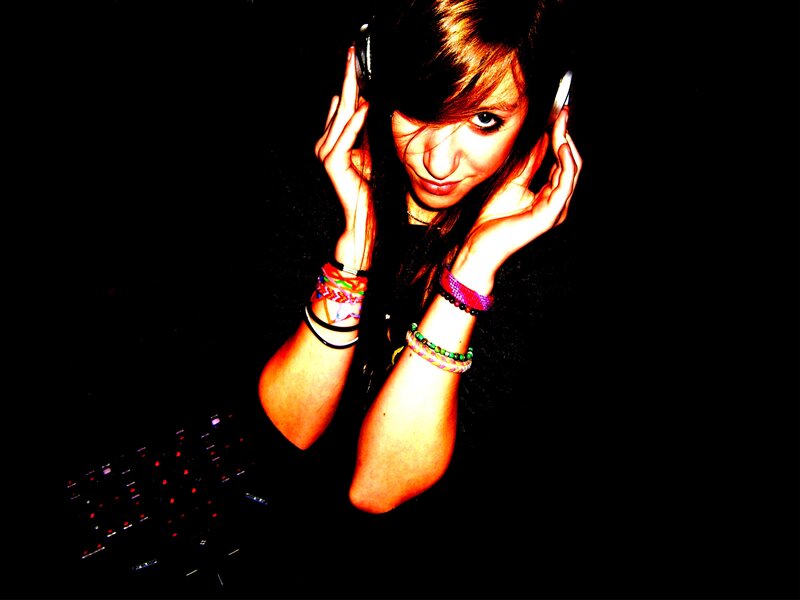 woman with headphones and bracelets