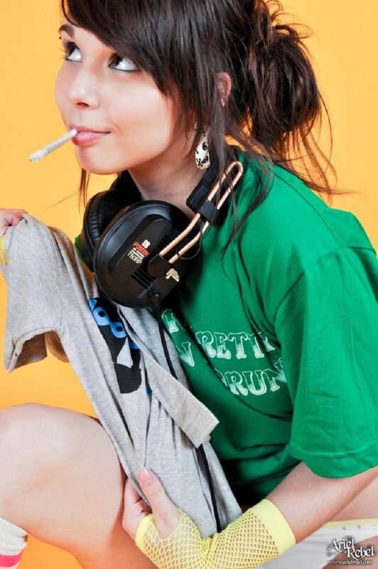 woman with headphones and cigarette