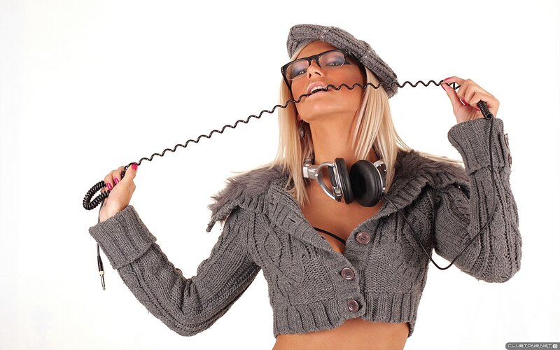 Woman with headphones and glasses