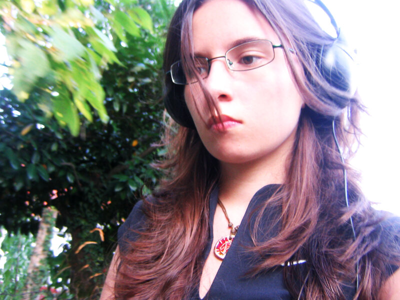 woman with headphones and glasses
