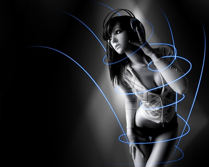 woman with headphones and light trails