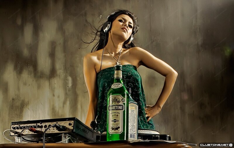 woman with headphones and liquor bottles