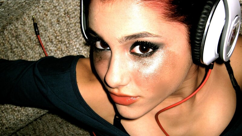 woman with headphones and makeup