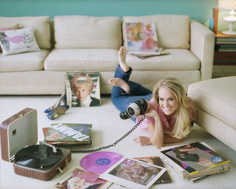 woman with headphones and records