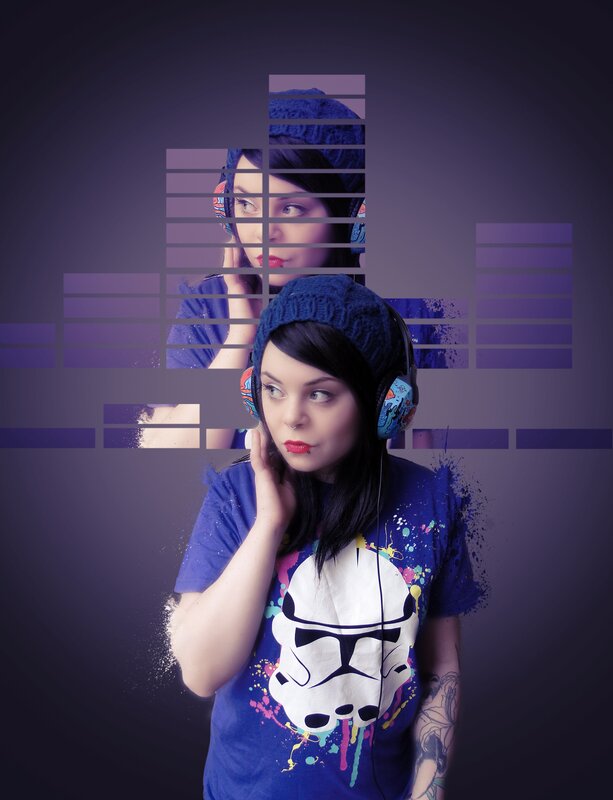 woman with headphones and stormtrooper shirt