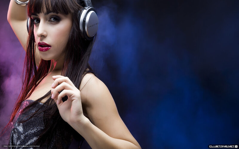 woman with headphones at club