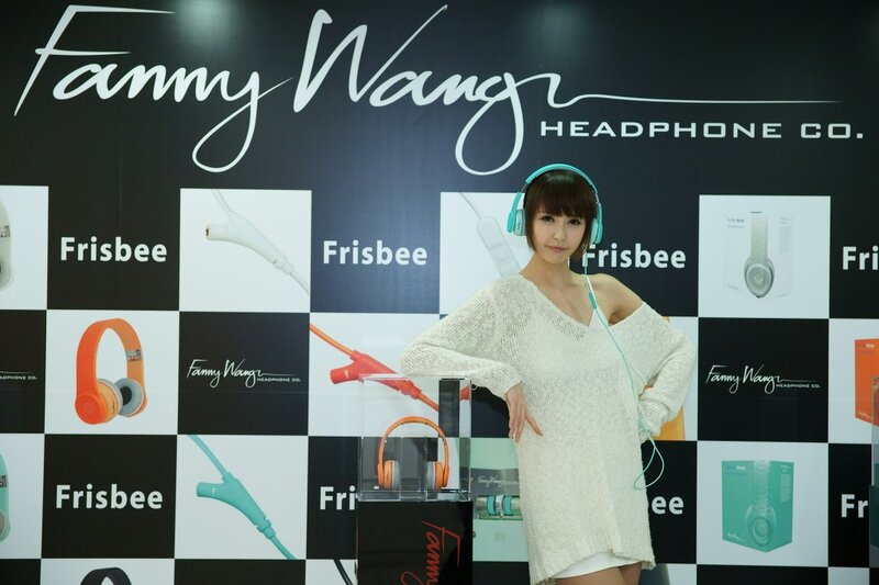 Woman with headphones at event