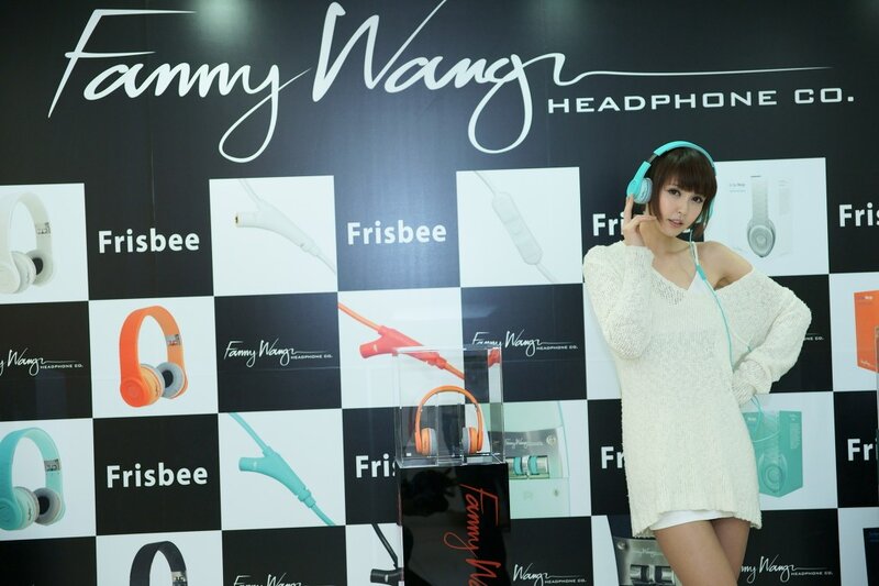 Woman with headphones at event