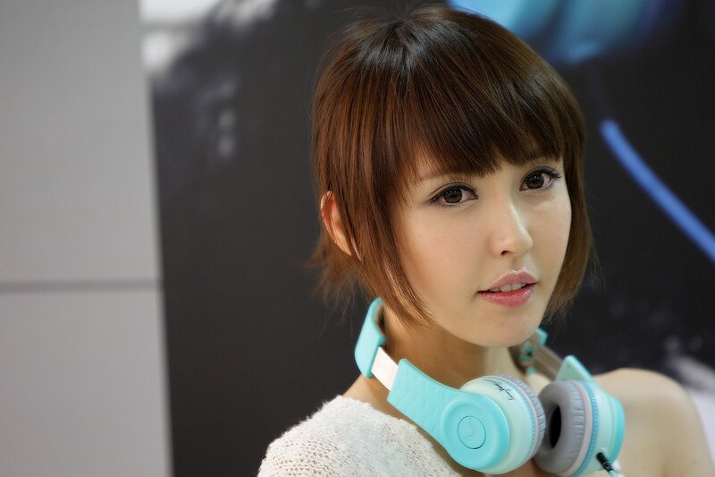 woman with headphones at event