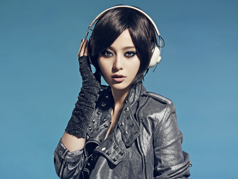 Woman with Headphones — Blue, Confident
