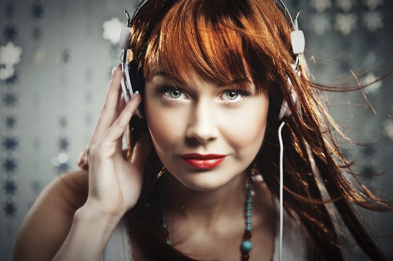 Woman with Headphones — Brown, Focused