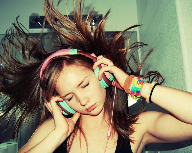 Woman with Headphones — Brown