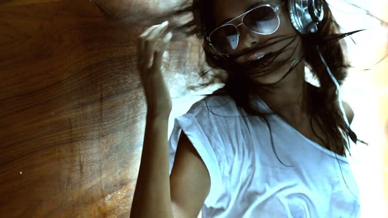 woman with headphones dancing