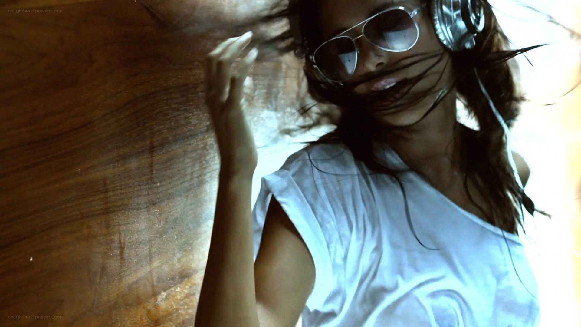 woman with headphones dancing