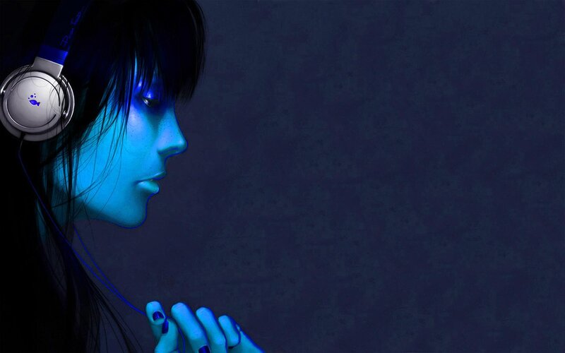woman with headphones in blue light