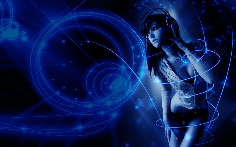 woman with headphones in blue light