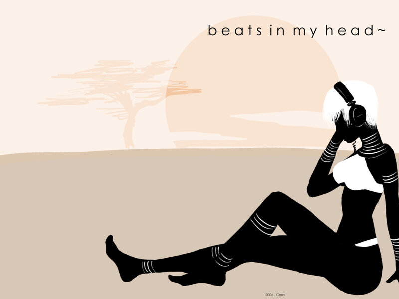 woman with headphones in desert