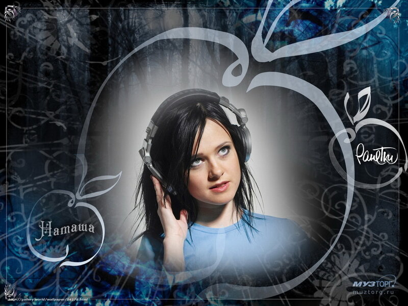 woman with headphones in forest