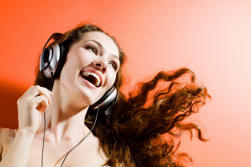 Woman with Headphones — Orange, Joyful