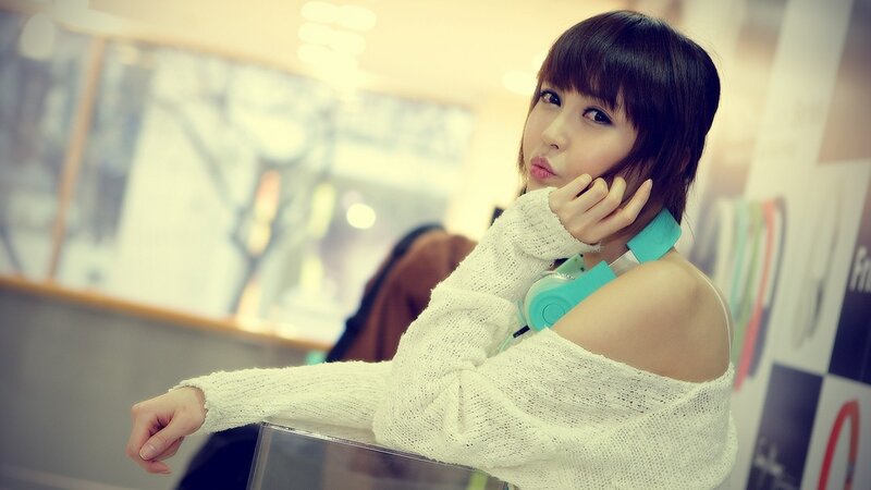 woman with headphones posing