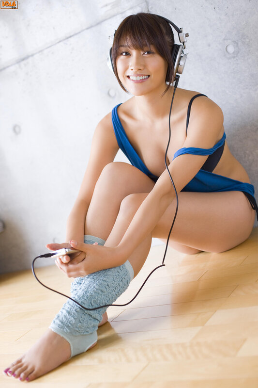 woman with headphones sitting