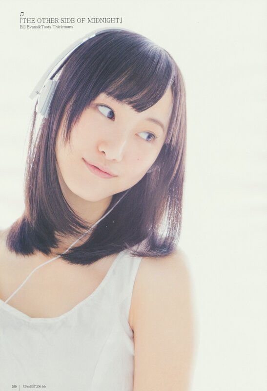 woman with headphones smiling