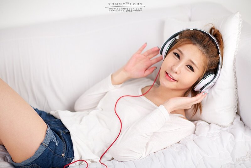 Woman with Headphones — White, Relaxed, Photograph, Pillow