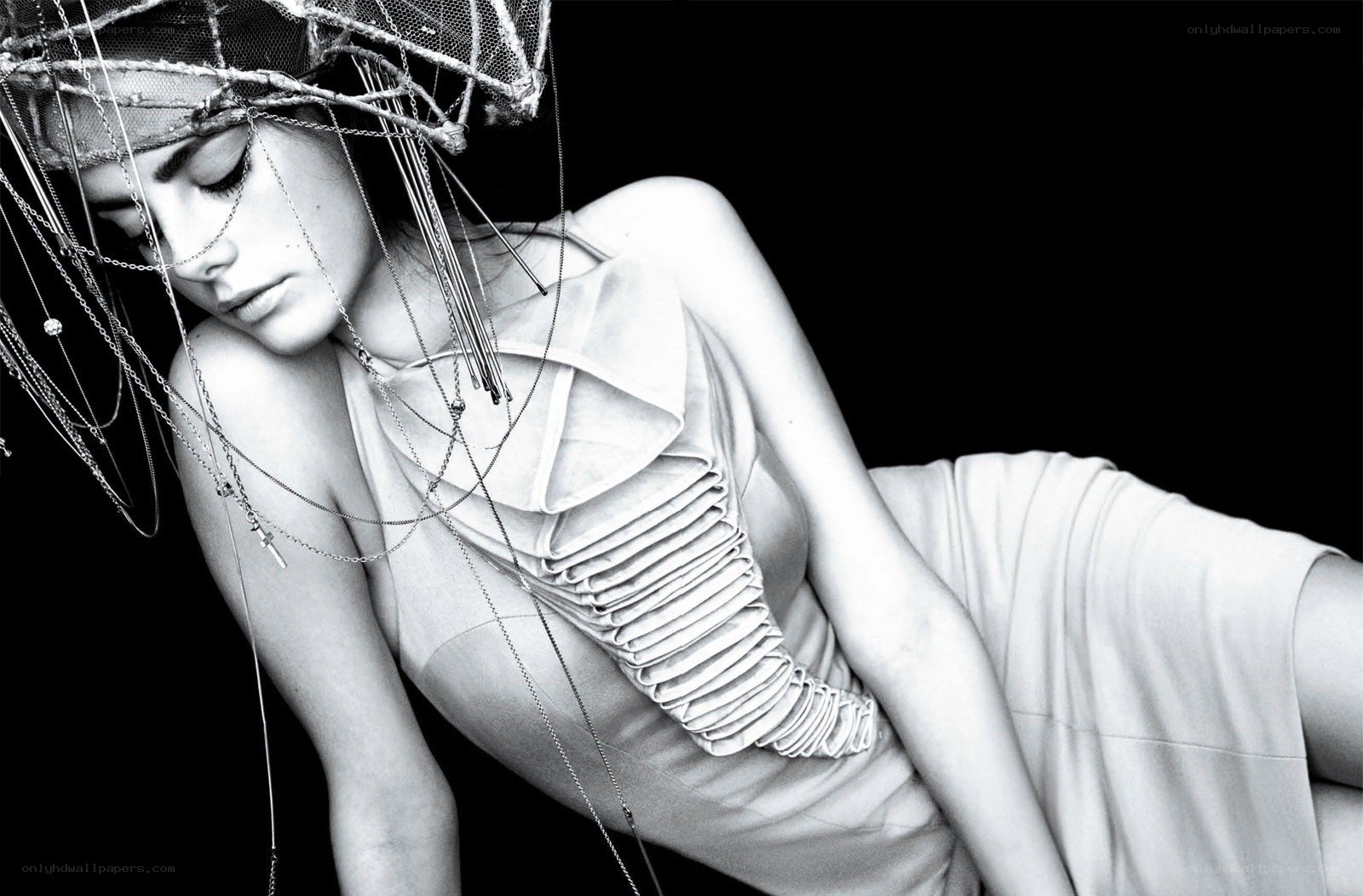 woman with headpiece and chains