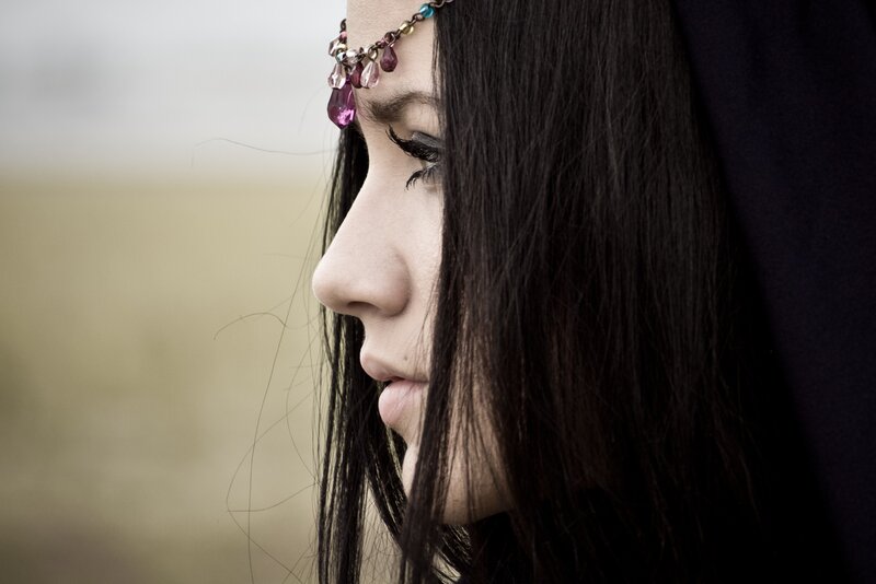 woman with headpiece in profile