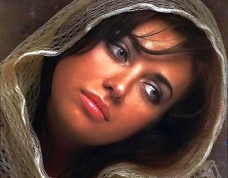 woman with headscarf looking up