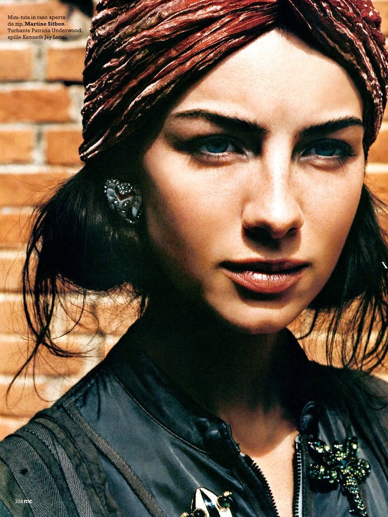 woman with headwrap and jacket
