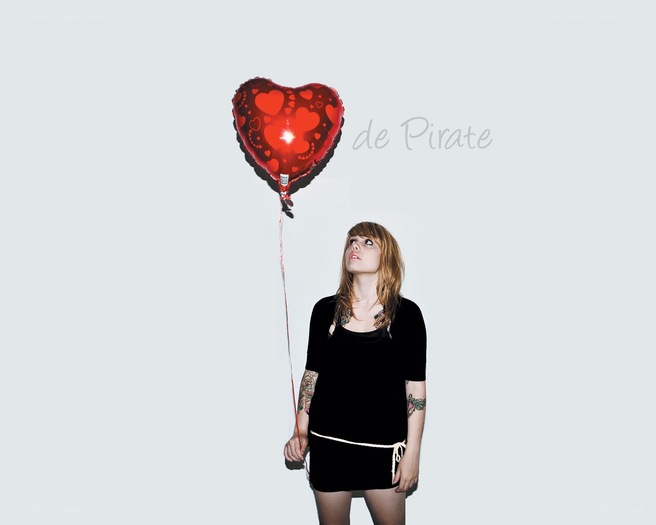 woman with heart balloon