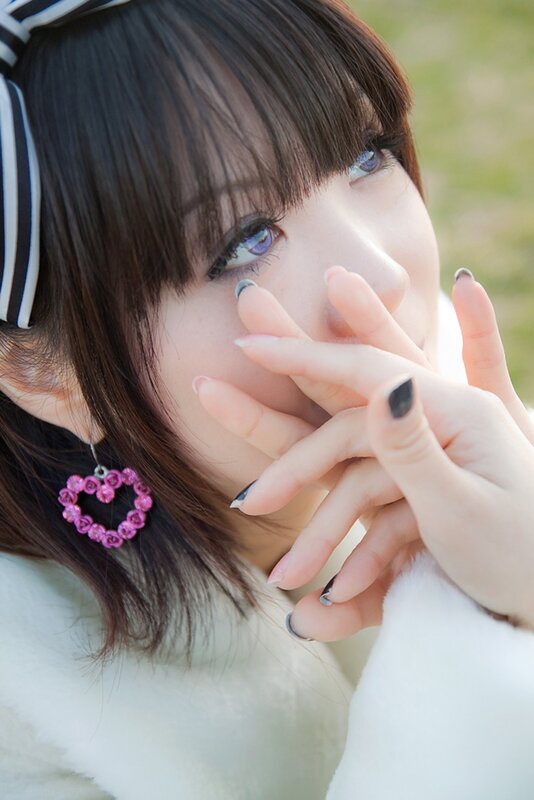 woman with heart earrings